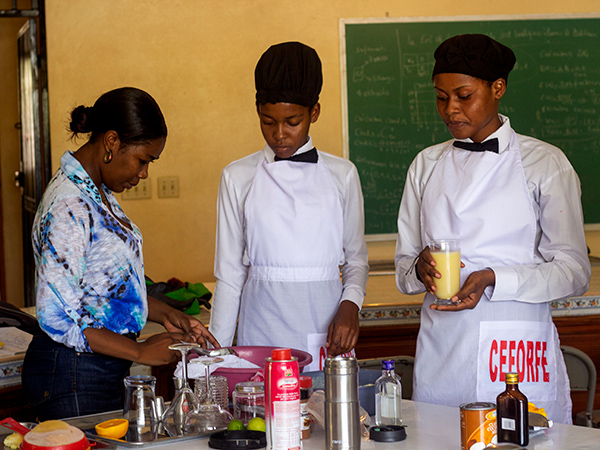 Haitian youth learn to cook as a skill