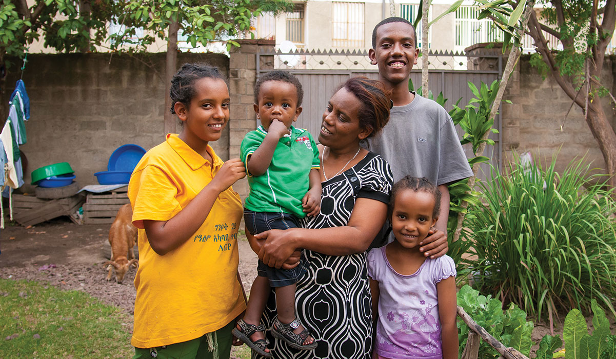 ethiopian family gathers in their yard