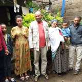 An Ethiopian family with their adopted daughter